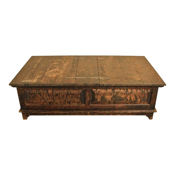 Large wooden coffee table–style chest.